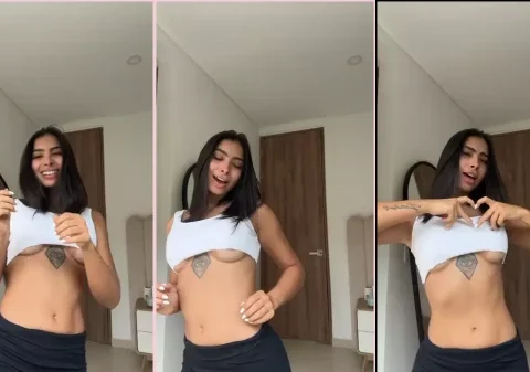 Colombiana muito gata dançando e brincando com o seus peitões
