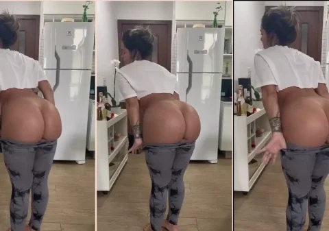 Mulher famosa abaixando a calça legging para mostrar o seu bumbum grande