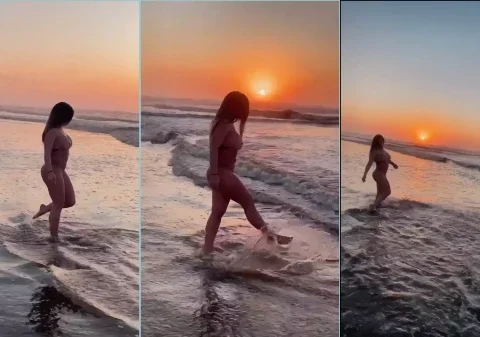 Gostosa pelada na praia exibindo o seu corpão sensual