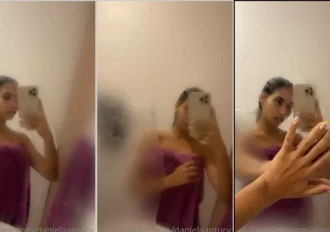 Colombiana muito linda e charmosa se exibindo no espelho depois do banho